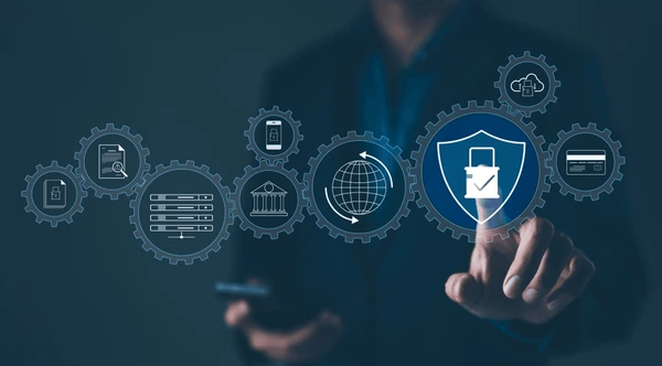 Team reviewing ISO 27001 documentation in a conference room